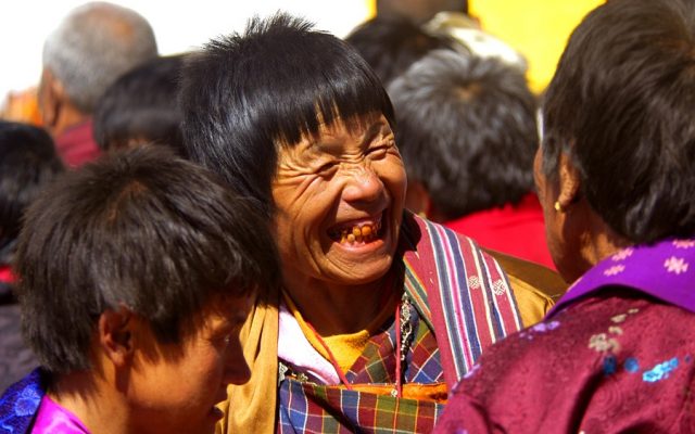 Three-Bhutanese-women-at-the-Paro-Festival.-The-teeth-stains-are-caused-by-chewing-betel-nut